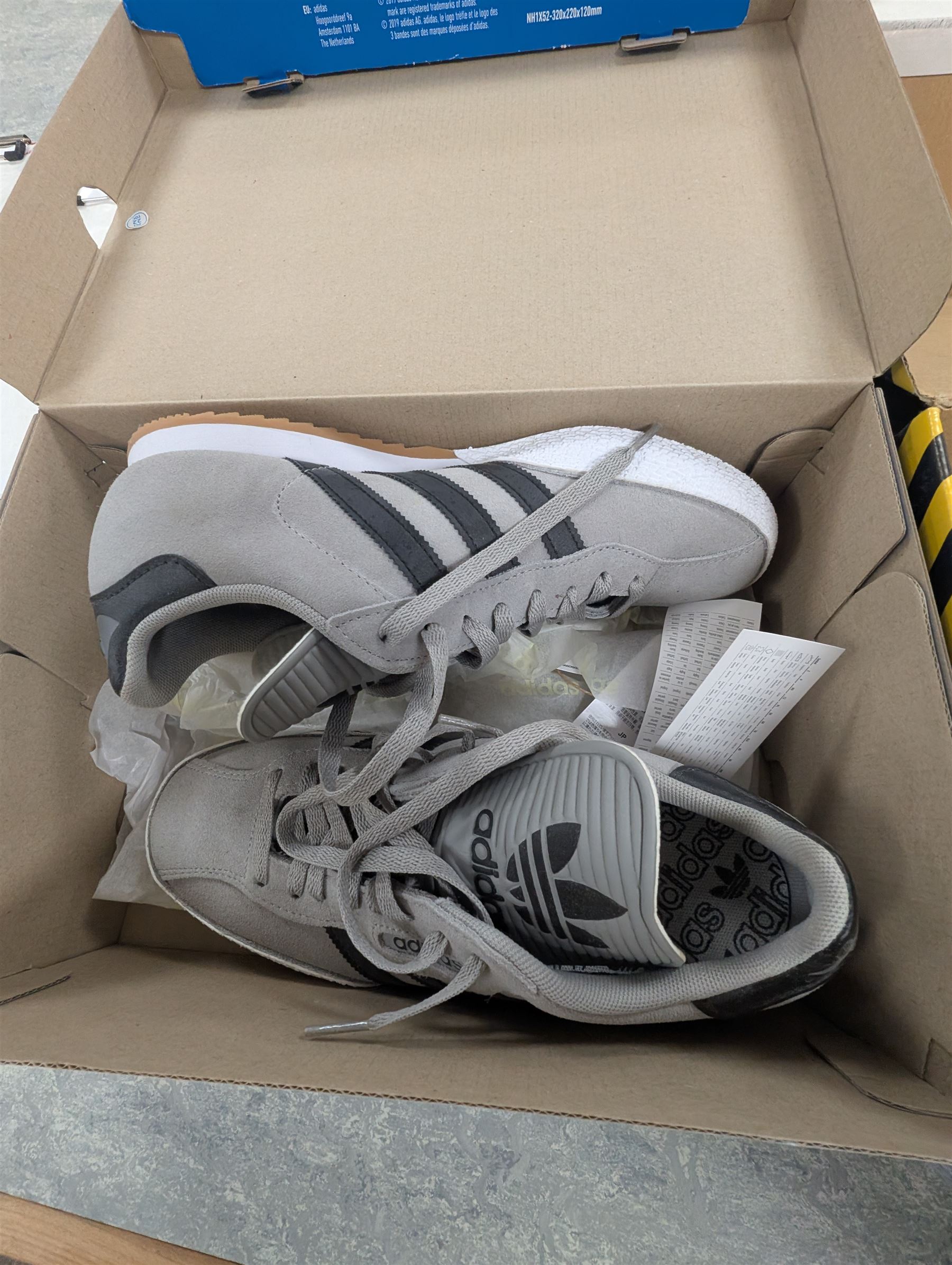 Pair of men's Adidas Samba trainers, Iron Maiden Trooper Beer, three DeAgostini Jaguar E Type magazines and a collection of costume jewellery