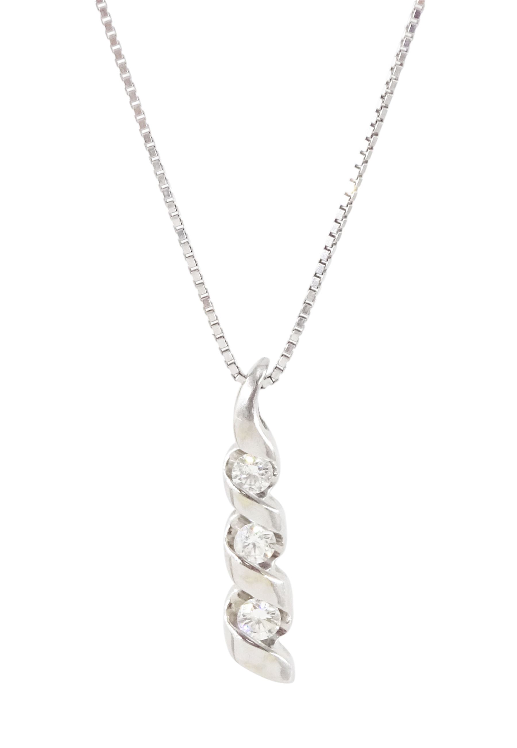 14ct white gold graduating three stone, round brilliant cut diamond pendant, on 10ct white gold box link chain necklace, both stamped, total diamond weight approx 0.65 carat