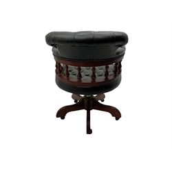 Captain's swivel desk chair, upholstered in studded green leather