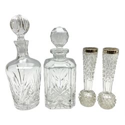 Silver collared cut glass vases, hallmarked Henry Williamson Ltd, and two clear glass decanters, tallest H28cm