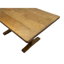 'Rabbitman' oak dining table, rectangular adzed top, on octagonal pillar supports on sledge feet joined by floor stretcher, carved with rabbit signature, by Peter Heap of Wetwang