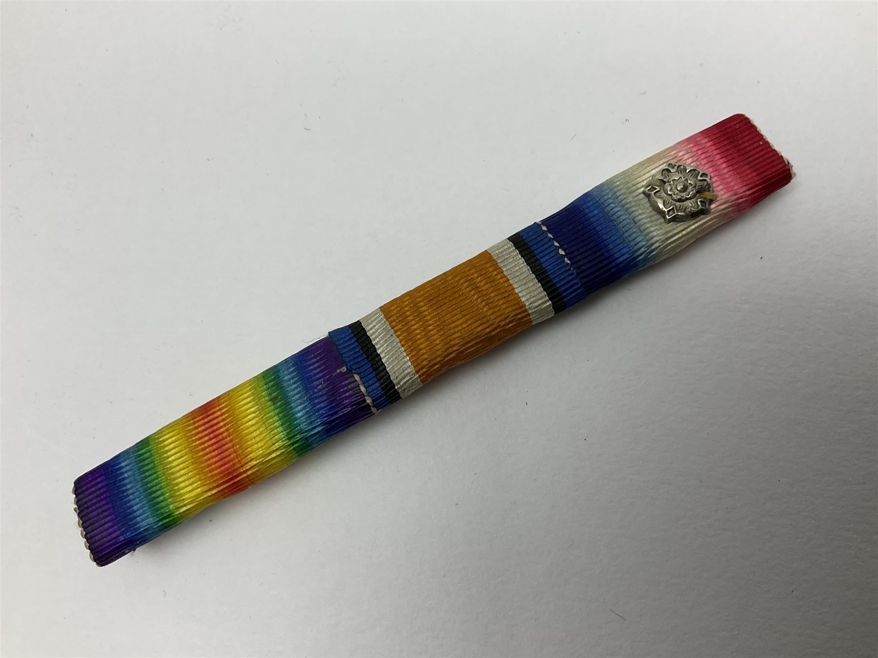 WW1 group of three medals comprising British War Medal, Victory Medal and 1914 Star awarded to 8328 Pte. G. Shaw Yorks: L.I.; on hanging bar with WW2 1939-1945 War Medal and WW1 ribbon bar with rosette to 1914 Star ; all with ribbons; and WW2 1939-1945 War Medal with ribbon