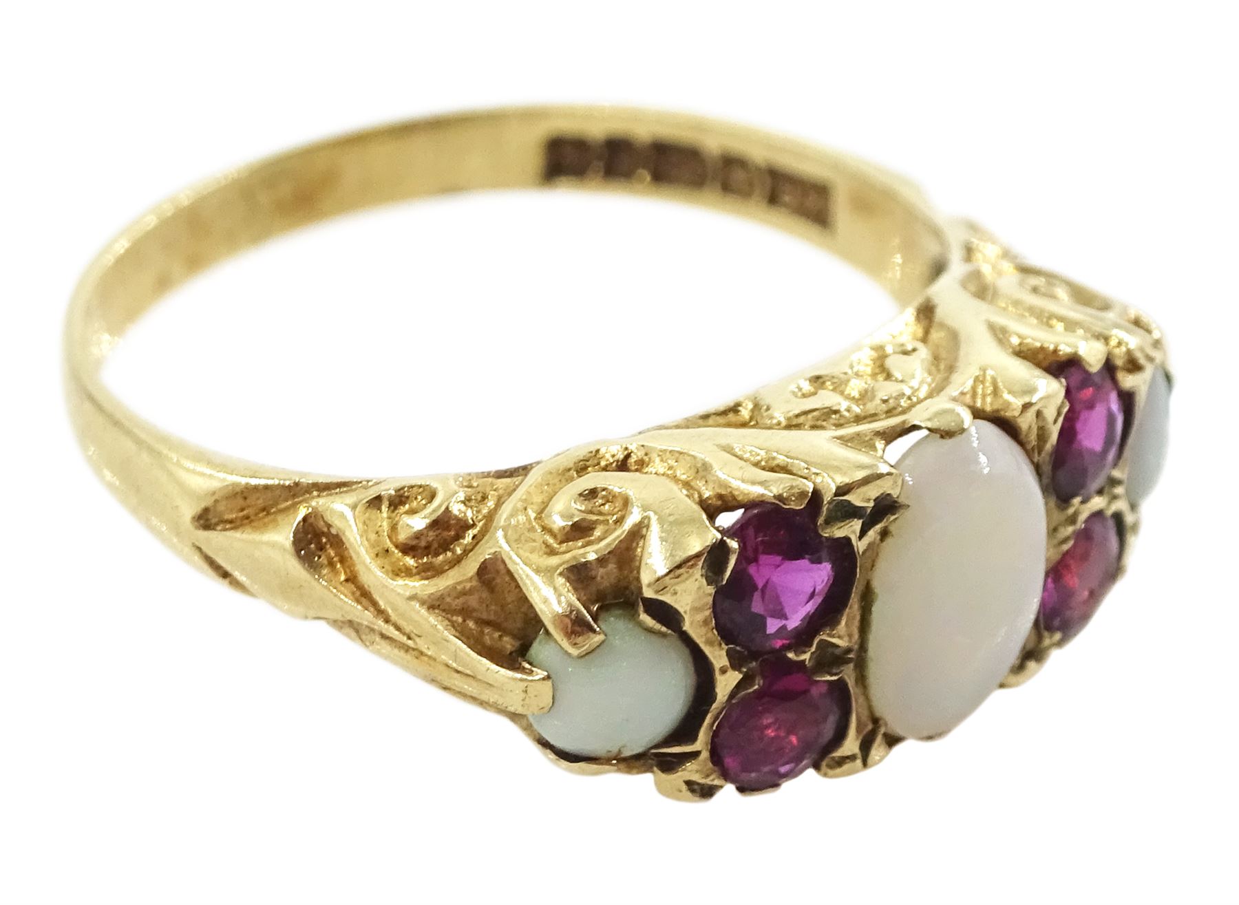 9ct gold three stone opal and four stone ruby ring, Birmingham 1976
