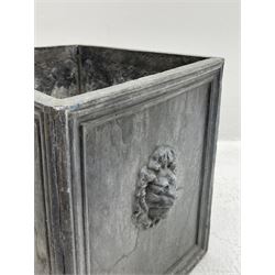 Lead jardinière planter of square form, the sides framed with mouldings and decorated with lion mask motifs
