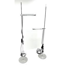 Pair contemporary polished and brushed metal adjustable standard lamps, on circular weighted bases, fitted with dimmer switch