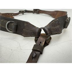 Pair of WW2 German Combat Y-Straps, circa 1938, the leather combat Y straps with metal clip fittings marked '...kuhren./1938, 11.trs.Abt.10' 