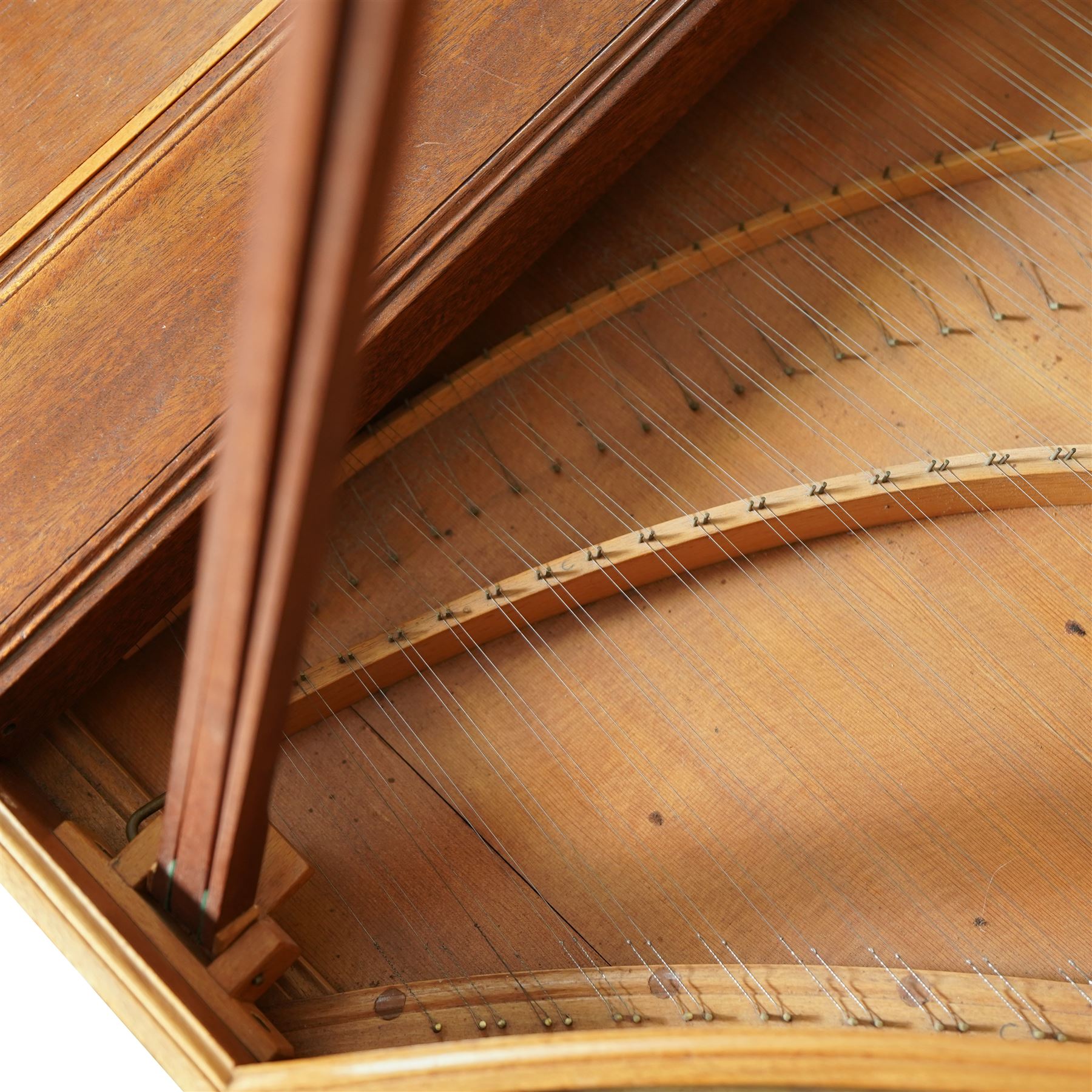 20th century “French style” Two manual Harpsichord by John Rooks of Tincknall (1971).
Double manual keyboards with three sets of strings: Two Unison, one octave and “buff” stop. Black outer casing with gold banding, five octave keyboards with 63 keys E1-G6, with black naturals and synthetic covered white sharps, inner lid painted with a rural scene, with adjustable music desk. Soundboard, bridges, strings and synthetic jacks in good condition with just one small crack to the treble area of the soundboard, key action with reasonable repetition and damping but in need of some regulation, case raised on turned baluster supports.

 You can find and listen to an example of Alan Cuckston playing this particular Harpsichord in the link below:
The King’s Hunt by John Bull

Given the intricate nature of these historic instruments, specialist support will be available if required, to assist successful buyers with safe removal and onward handling. Price upon application. 

