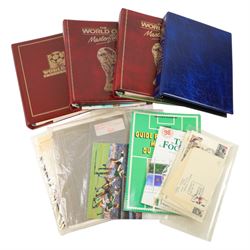 Football-themed stamps, including 'The World Cup Collection' in three folders, further fir...