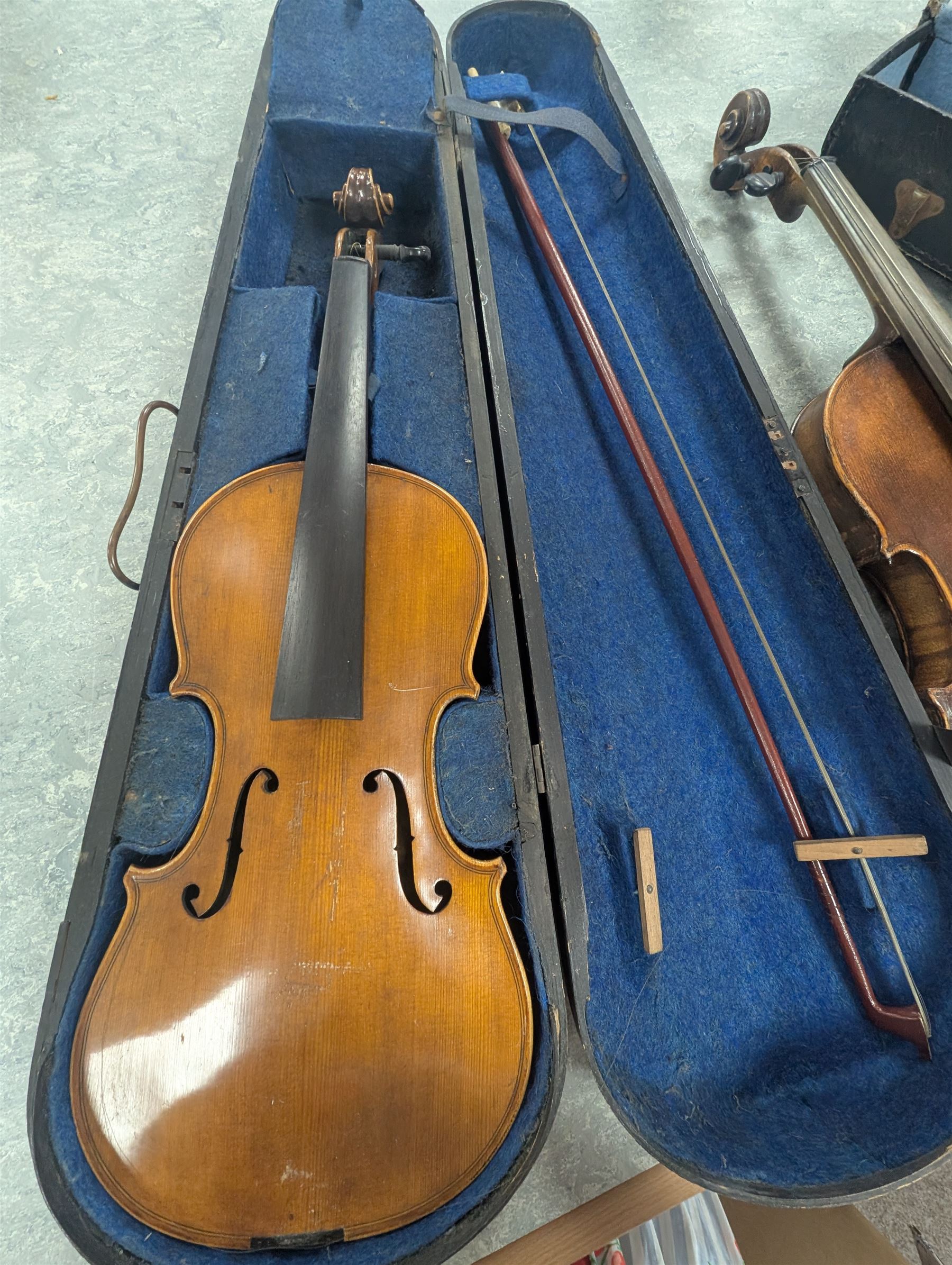 Two violins, including Excelsior example in coffin case and one with spurious William Duke label, and a Luigi D'Ancora mandolin