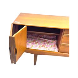 Stonehill - mid-20th century teak sideboard, three central drawers flanked by concertina cupboard doors, on tapering supports
