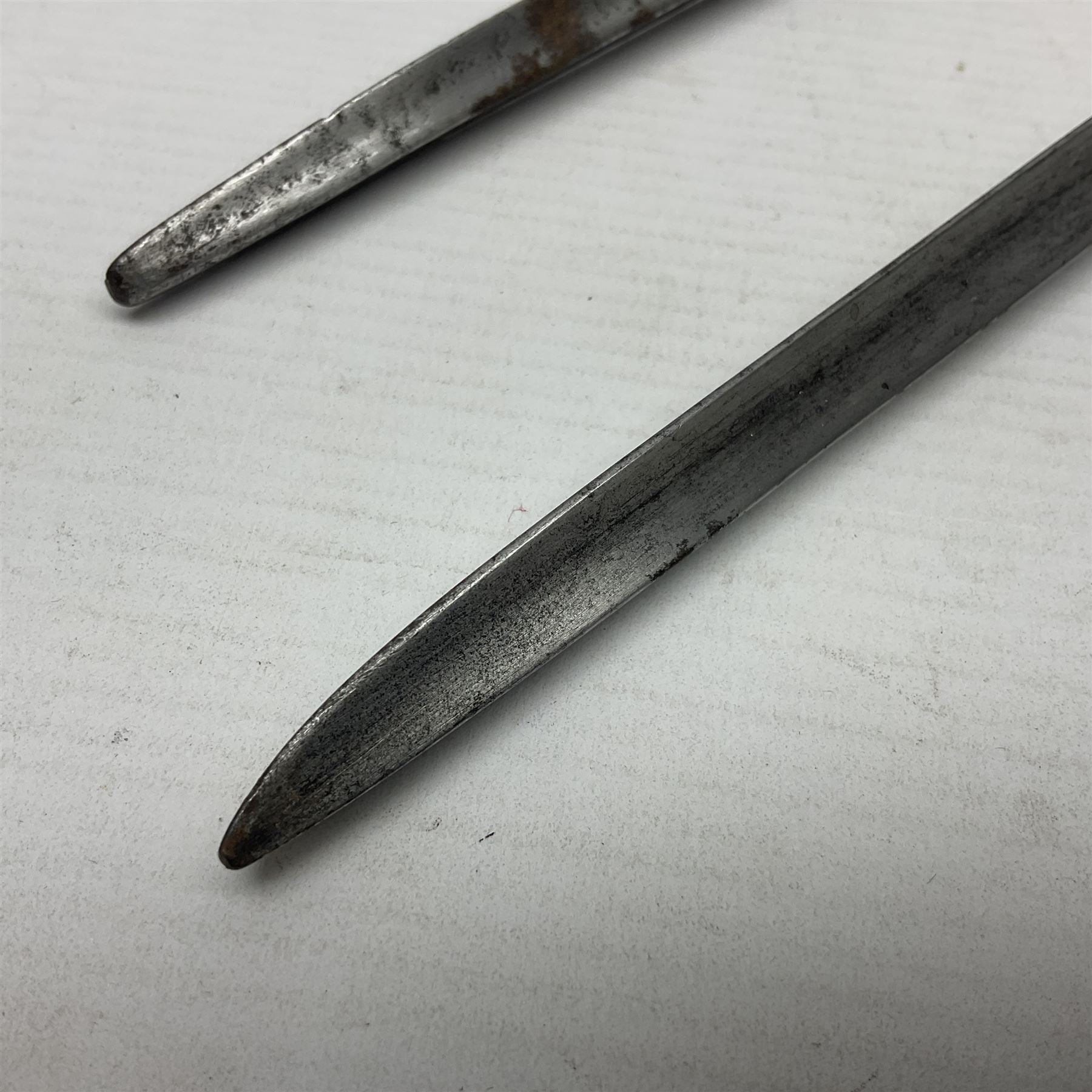 Brown Bess type New Land Pattern socket bayonet L47cm; and a Royal Enfield Pattern 1853 socket bayonet; both lacking scabbard (2)