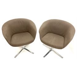 Pair Person Lloyd for Walter Knole swivel turtle chairs on polished metal supports 
