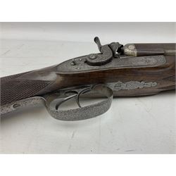 19th century John Jefferson of Scarborough 6-bore (modern 4-bore) double barrel side-by-side percussion gun, with 81cm stub twist damascus barrels (no provision for ramrod), well figured walnut stock with fine chequered grip and fore-end with horn tip and steel butt plate with long tang, well engraved lock and hammers with half-cock safeties on both sides, barrel sling swivel but rear sling swivel removed and replaced with silver escutcheon, London proofmarks, NVN, L128cm