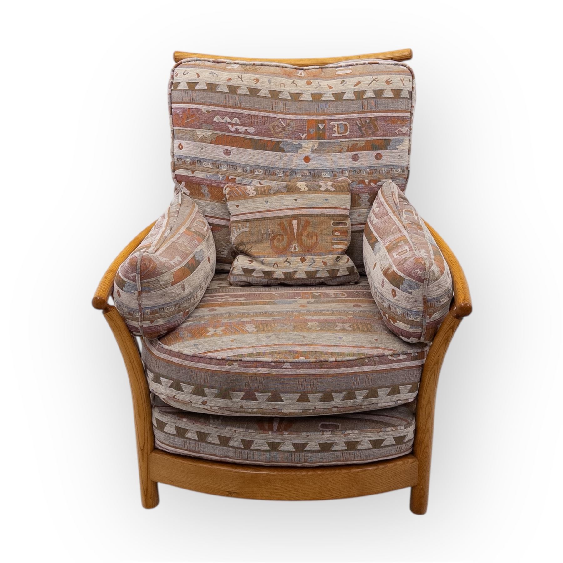 Ercol - Renaissance ash and elm high back armchair, upholstered in geometric Kilim patterned fabric with padded back, seat and arm cushions, curved stick back frame and turned supports