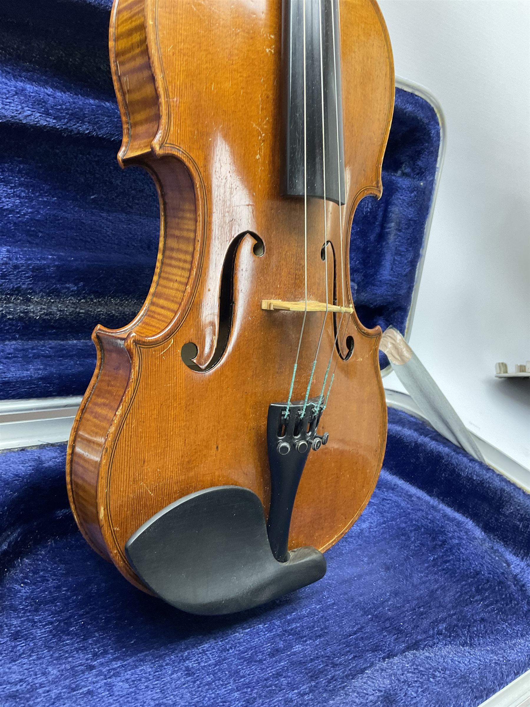 Early 20th century German Ernst Kreusler violin with 36cm two-piece maple back and ribs and spruce top, bears label 'Ernst Kreusler Dresden Anno 1925  Hand made reproduction of Antonius Stradivarius Cremona', overall L59cm; in hard carrying case