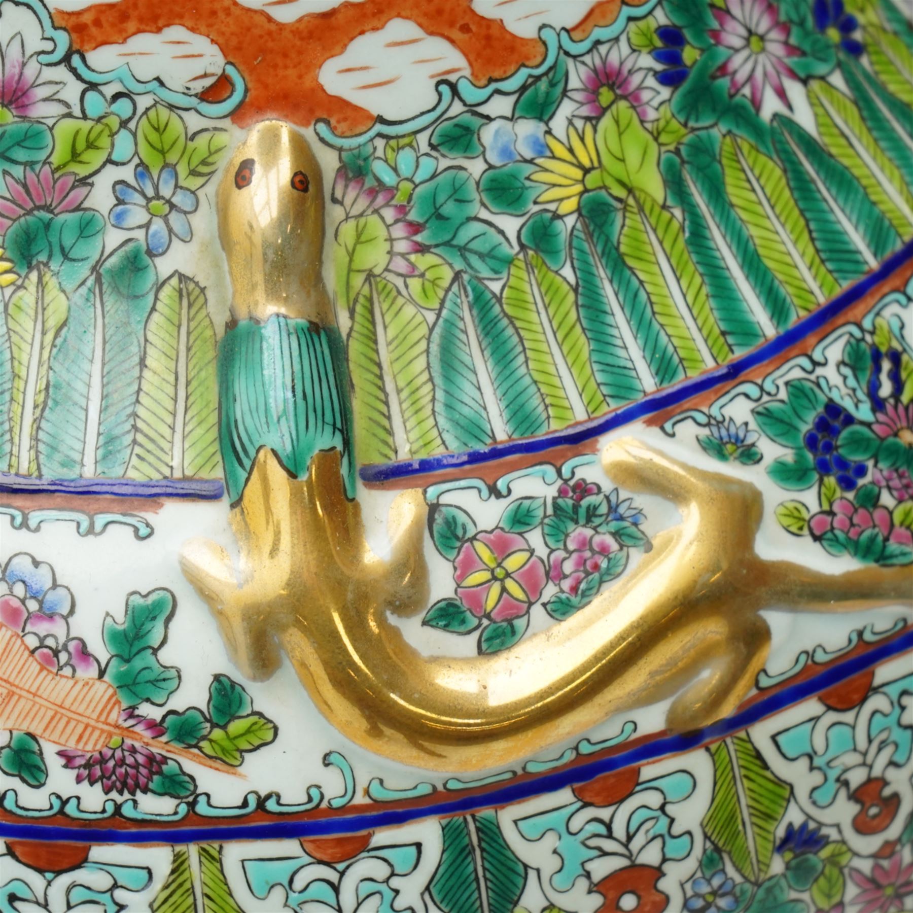 Pair of large 20th century Chinese famille rose floor vases, each of baluster form with waisted neck with gilt foo dog mounted shoulders, and lobed flared rim, decorated with alternating reserves of figures and birds and butterflies amidst blossoming flowers, the white ground profusely detailed with flower heads, each with character mark beneath, H87cm 