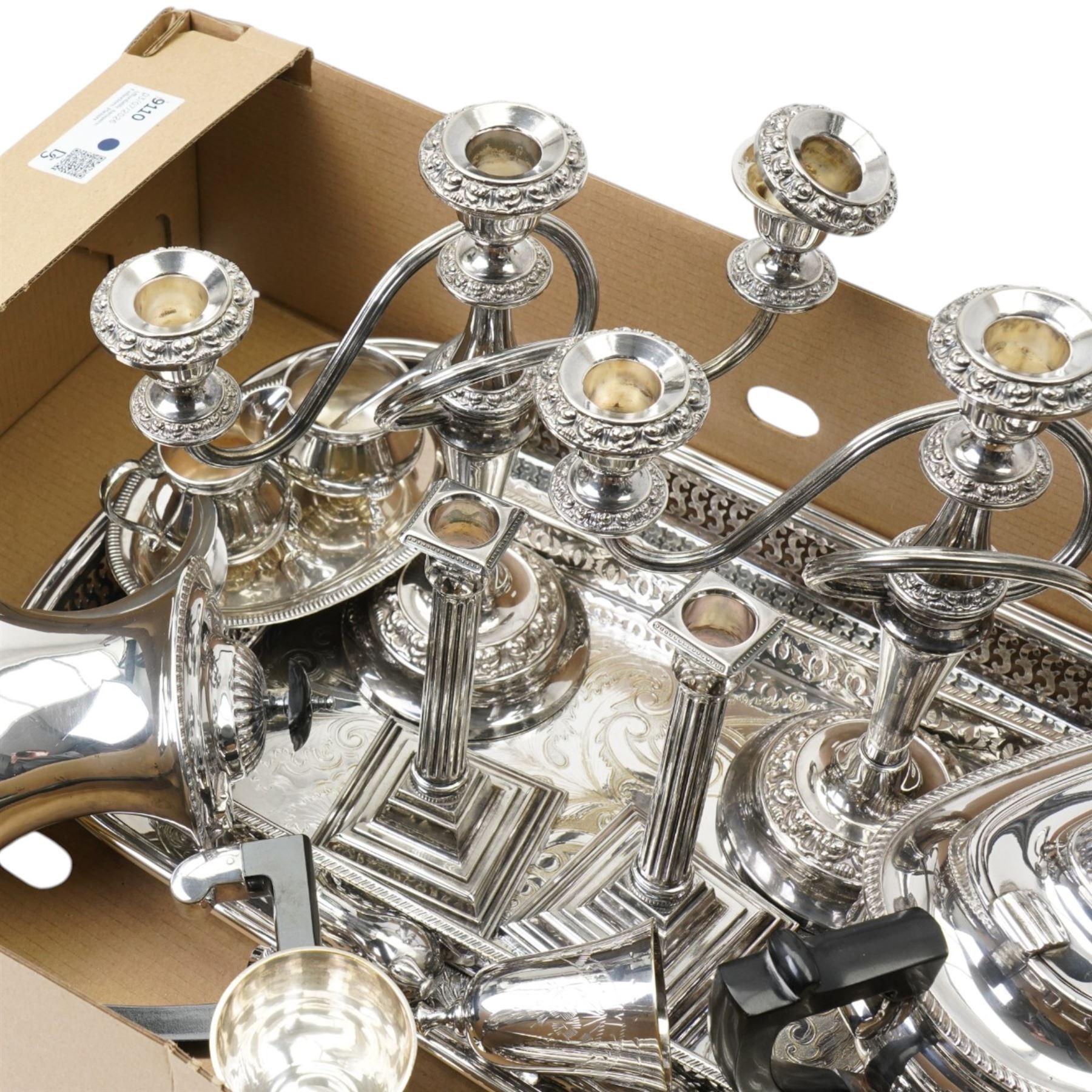 Silver plated items including four piece tea set, pair of candelabra, pair of candlesticks, sugar bowl and cream jug with silver spoon etc