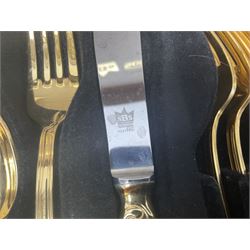 Bestecke Solingen canteen of gold plated cutlery for twelve place settings, including ladle, cake slice and serving spoons, contained within a briefcase, together with a matching set twelve of Bestecke Solingen gold plated fish knives and forks, in fitted case 