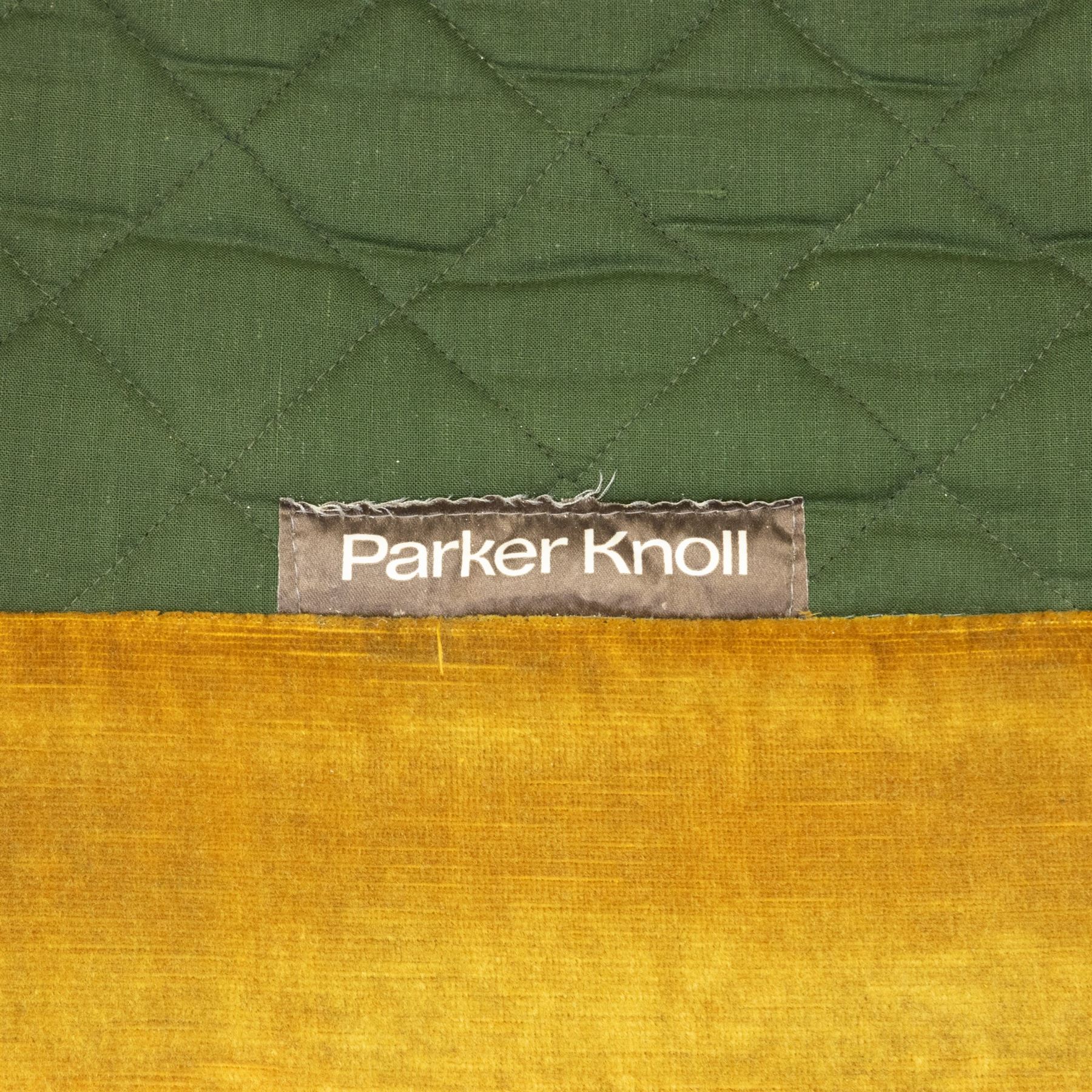 Parker Knoll - Golden yellow velour recliner, raised on castors