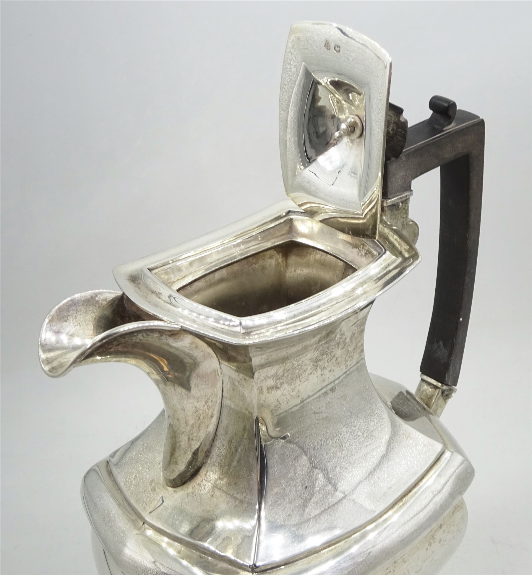 Raich Carter - presentation hallmarked silver two-handled tray of rounded oblong form with gadrooned rim by Wilson & Gill, 139 Regent Street, London, inscribed to the centre 'Presented to Mr. & Mrs. Raich Carter by the Lord Mayor of the City and County of Kingston-upon-Hull Alderman R.E. Smith J.P. on May 30th 1952on behalf of the many Admirers who subscribed to The Lord Mayor's Testimonial Fund in recognition of Raich Carter's genius as a footballer and his services to the City', London 1937 82oz L61cm; together with a hallmarked silver four-piece tea and coffee set by Cooper Bros. & Sons Ltd, the teapot of London shape with ebonised handle and knop, each piece engraved with an initial 'C', Sheffield 1920  60.5oz, teapot L29.5cm