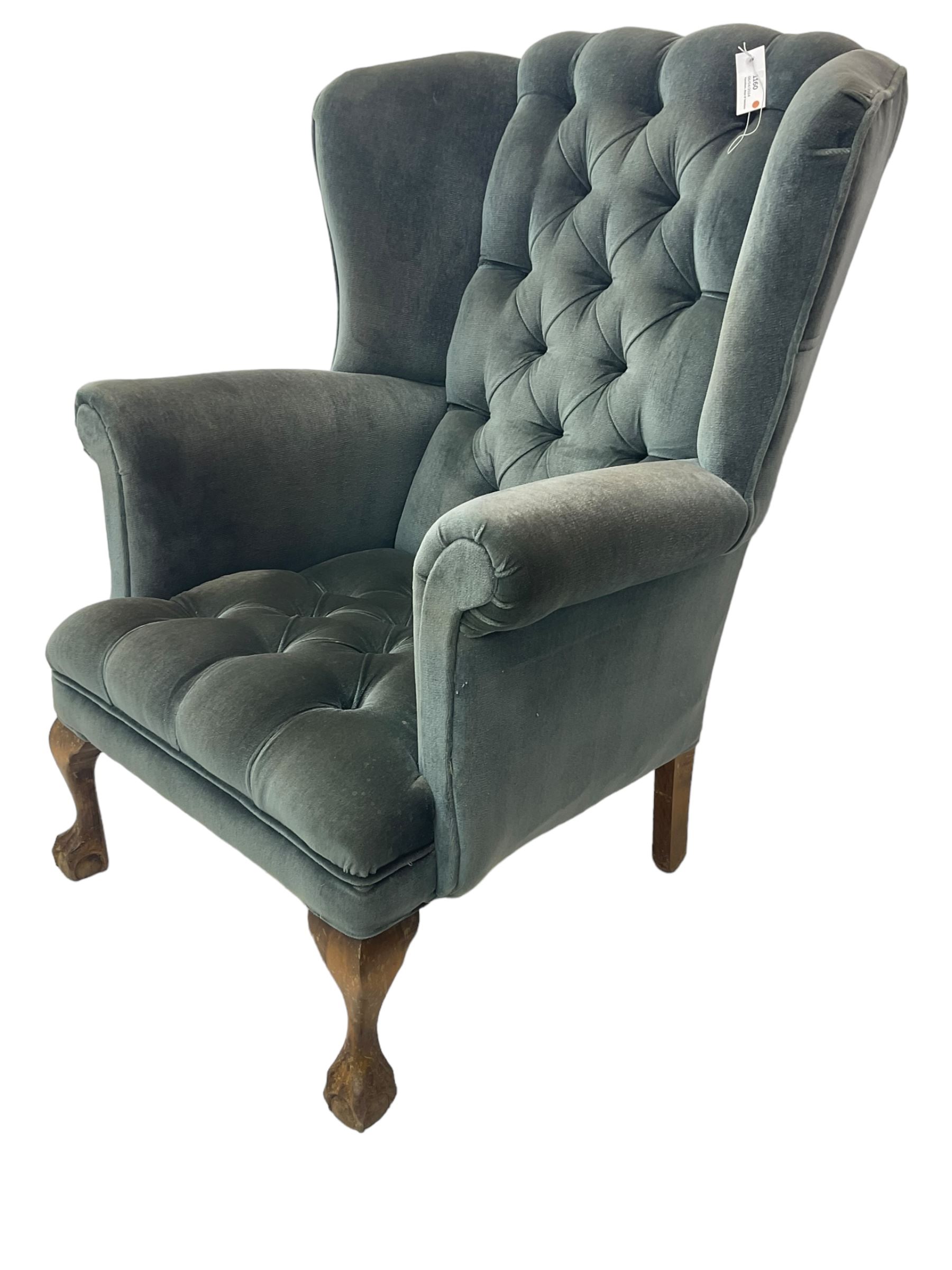 Georgian design wingback armchair, traditional shape with rolled arms, upholstered in teal velvet fabric, on cabriole supports with ball and claw feet