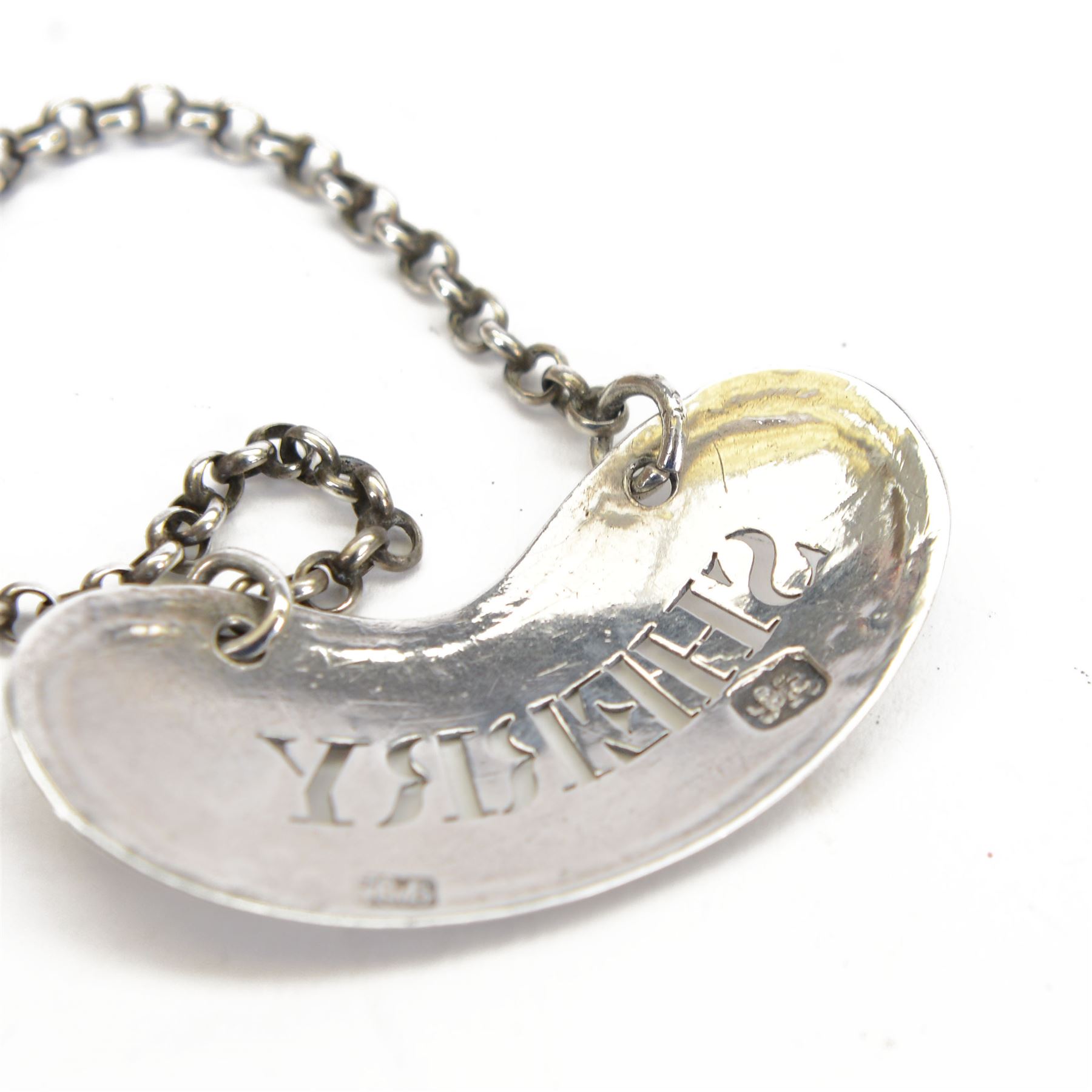 Georgian silver 'Sherry' decanter label, of curved form with pierced lettering, hallmarked Hester Bateman, no date mark