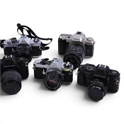 Nine Pentax cameras, including MX, MZ-5, ME Super, P30, etc all with lenses