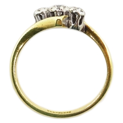  Gold three stone diamond cross over ring, stamped 18ct plat  