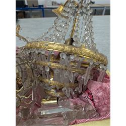 Four brass and glass chandelier light fittings