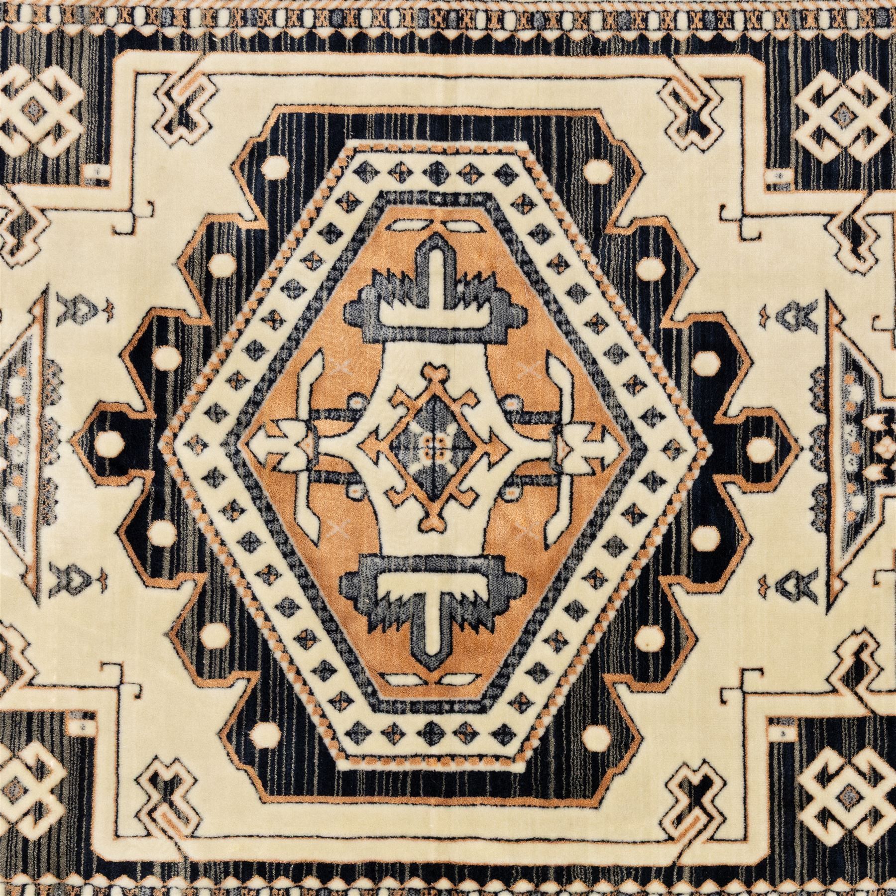 Two rugs, small Bokhara-type rug, terracotta ground with repeating hooked lozenge medallions enclosed by geometric borders (H 120cm, W 83cm); and a cream-ground rug, central lozenge medallion with geometric spandrels and border motifs (H 145cm, W 101cm),
