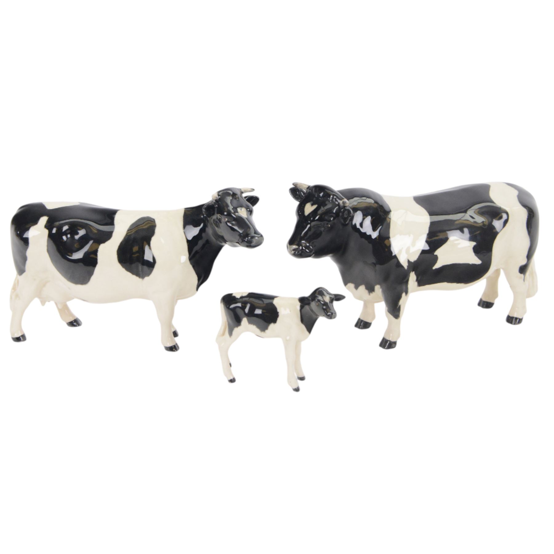 Beswick Friesian Cow family group, comprising Bull CH. Coddington Hilt Bar 1439, Cow CH. Claybury Leegwater 1362 and Calf 1249
