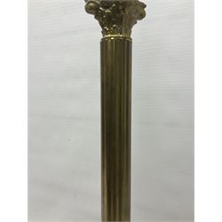Brass table lamps in the form of Corinthian column, upon a stepped footed base, H65cm