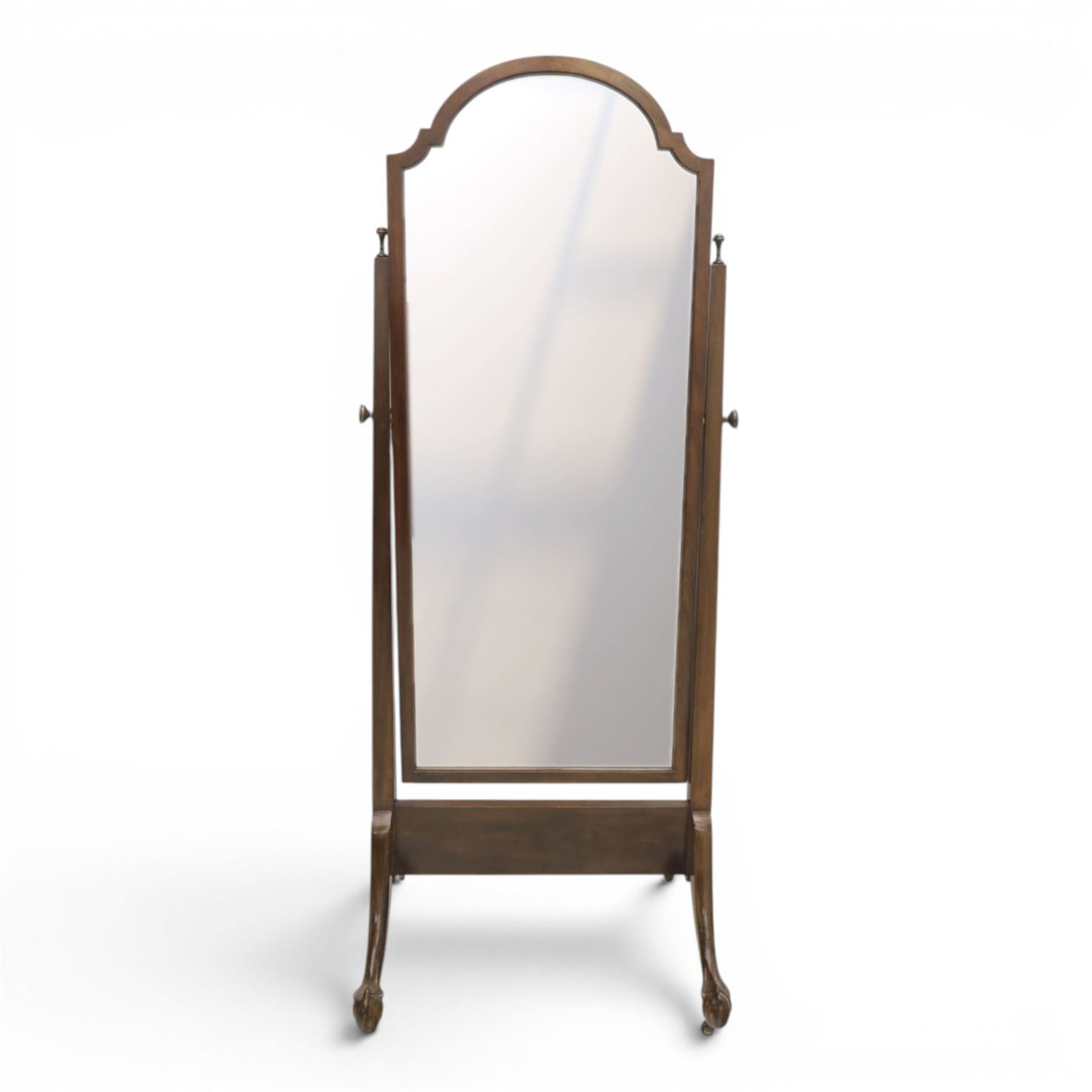 Georgian style mahogany cheval mirror, arched rectangular mirror plate within a moulded frame, on turned supports with brass adjustment mounts, raised on downswept supports terminating in claw feet