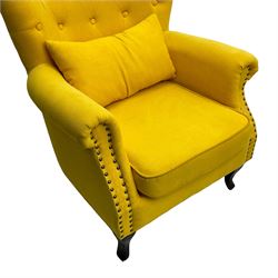Warmiehomy - Georgian design armchair, fanned back over rolled arms, upholstered in buttoned yellow fabric, on ebonised cabriole supports
