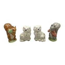 Royal Albert Squirrel Nutkin and Timmy Tiptoes figures together with two Beswick Staffordshire style dogs