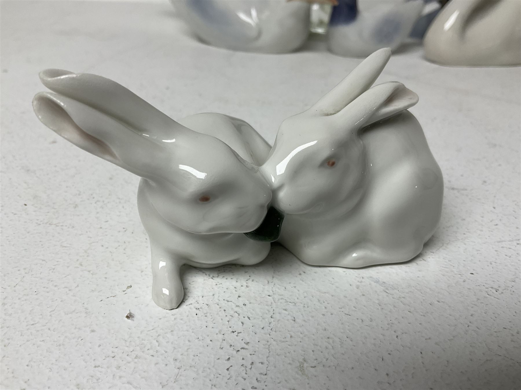 Seven Royal Copenhagen figures, including Arctic tern no 827, Swan no 755, Kingfisher no 2257 etc, together with Royal Copenhagen dish