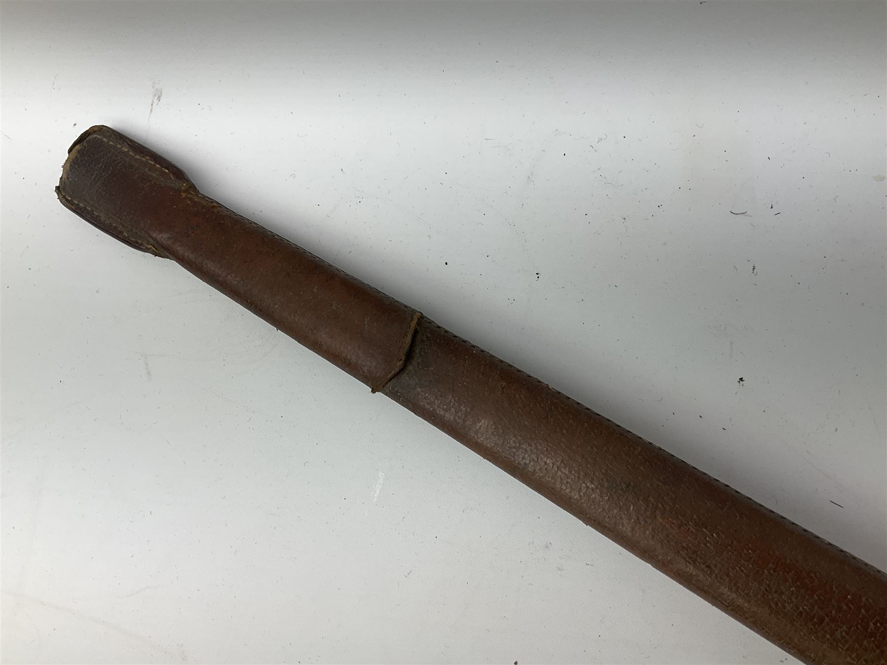 Victorian artillery officer's sword, the 90cm fullered steel blade by E. Thurkle Denmark Street Soho London decorated with Victoria cypher, Regimental crest and 'Royal Artillery', three-bar hilt with stepped pommel and wire-bound fish skin grip; in leather covered scabbard L107cm overall