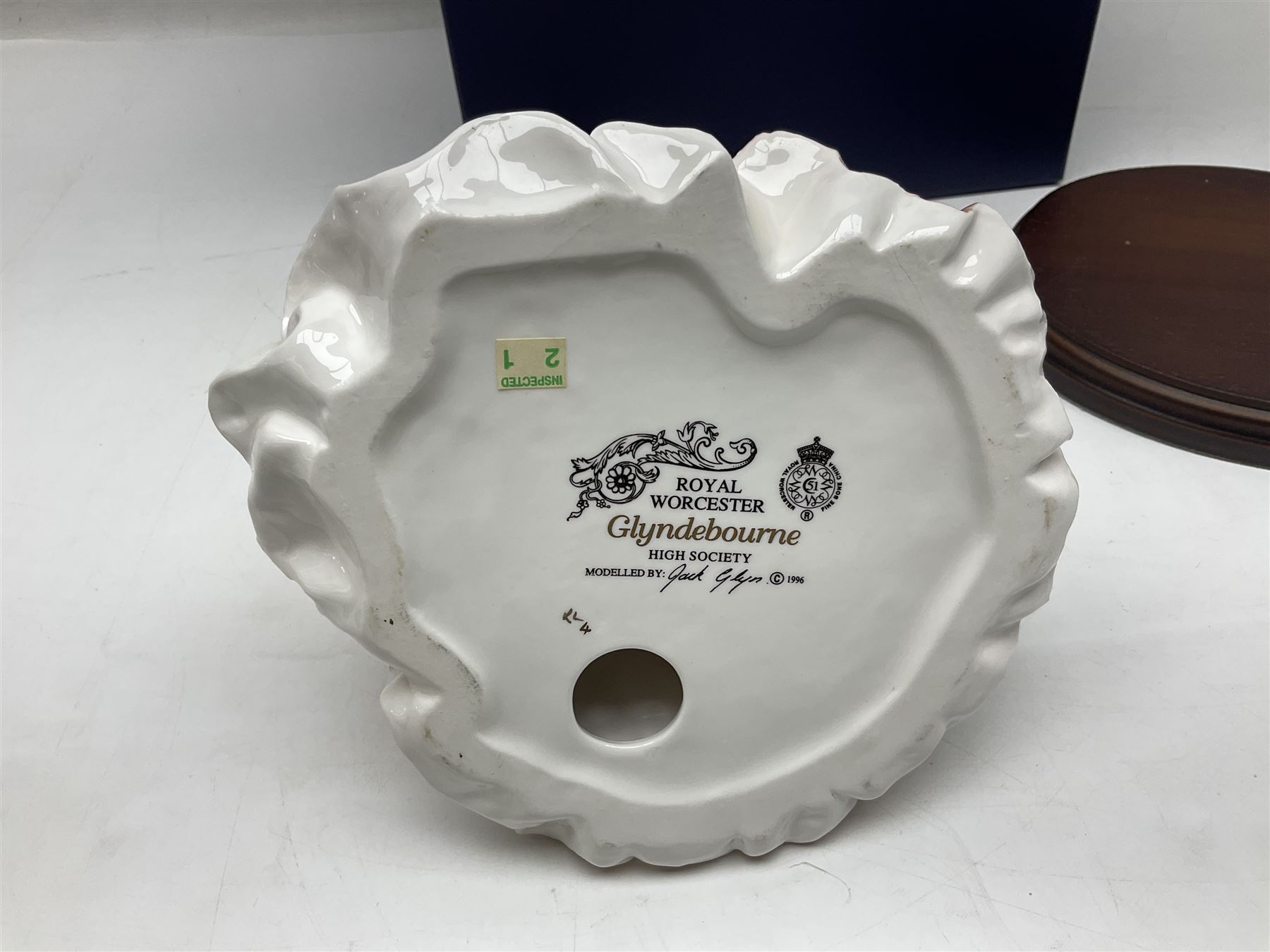 Three Royal Worcester figures, comprising Glyndebourne, with original box, Royal Worcester Special Even 1998 Elizabeth, with certificate and original box, and In Celebration of the Queens 80th Birthday 2006 