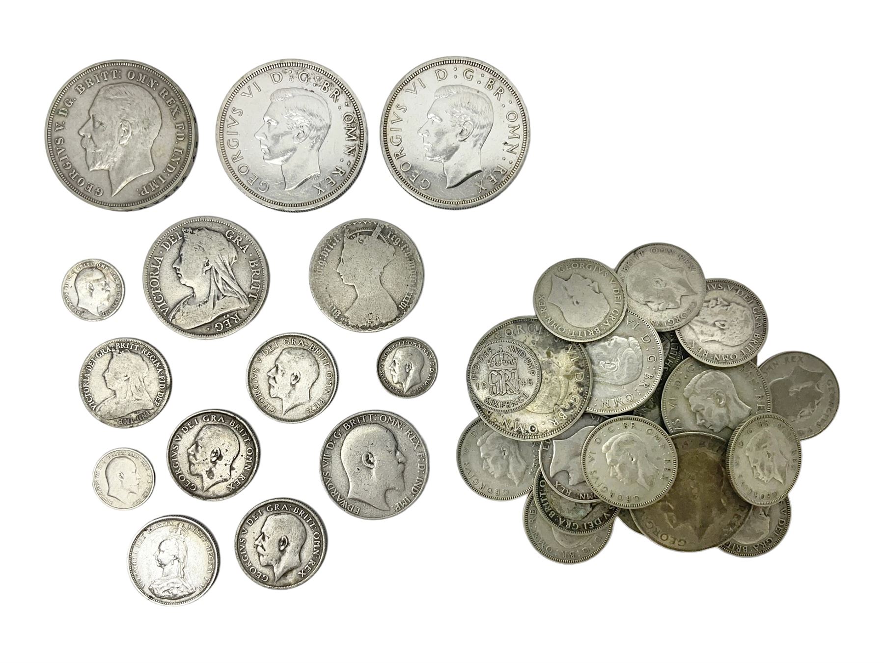 Approximately 65 grams of Great British pre 1920 silver coins and approximately 230 grams of pre 1947 silver coins, including King George V 1935 crown and two King George VI 1937 crowns