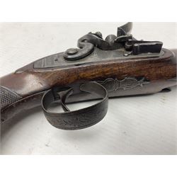 Early 19th century Wm. Hollis flintlock belt or pocket pistol, approximately 20 bore, the 10cm barrel with ram rod under, engraved lock plate with maker's name and roller frizzen, engraved trigger guard with pineapple finial and walnut stock with chequered grip L25cm overall