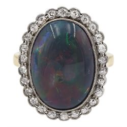 Early 20th century gold milgrain set oval opal and old cut diamond cluster ring, stamped 9ct 