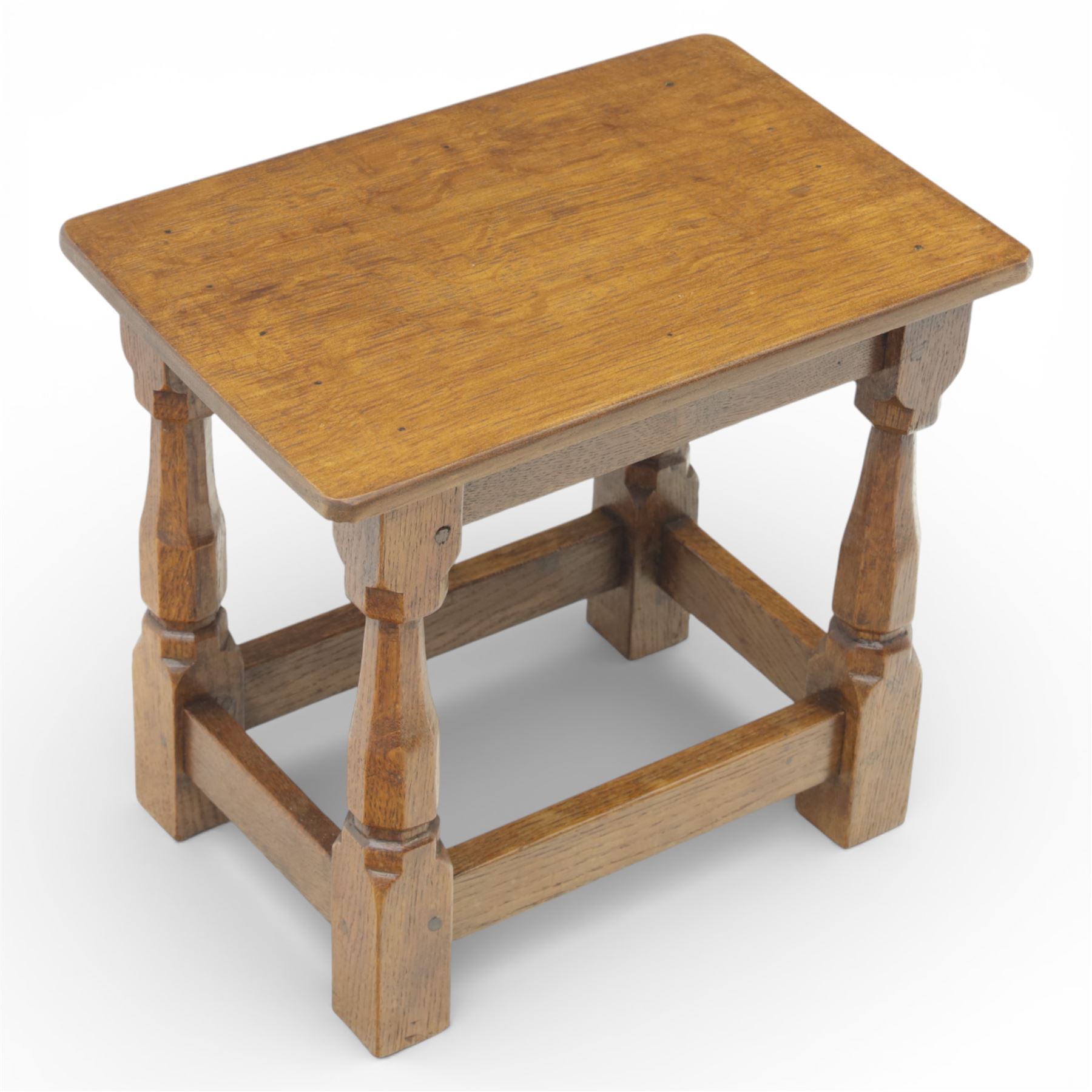 Sid Pollard of Thirsk - oak joint stool, the rectangular top with rounded corners over turned block supports united by stretchers 