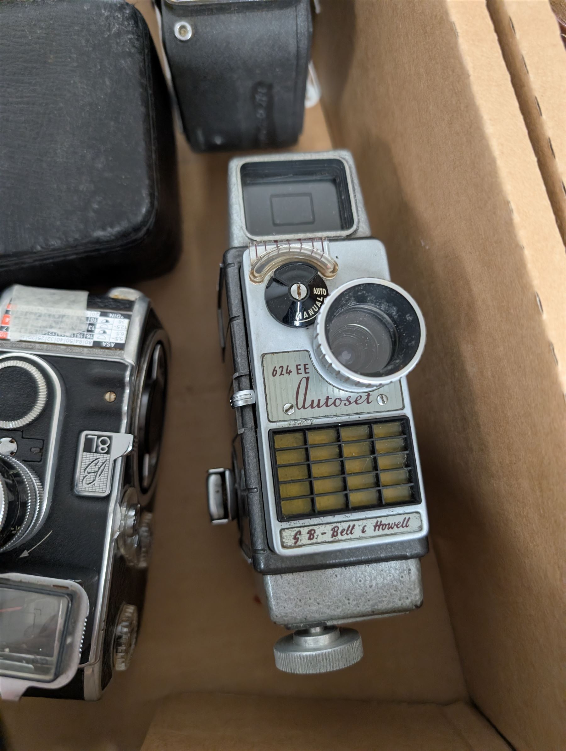 Collection of vintage cine cameras, including Bolex Paillard B8L, Mansfield Holiday Meter Matic, Quarz, Bell & Howell Autoset, Sankyo Super Micro, Canon Demi C, Agfa Movexoom, etc