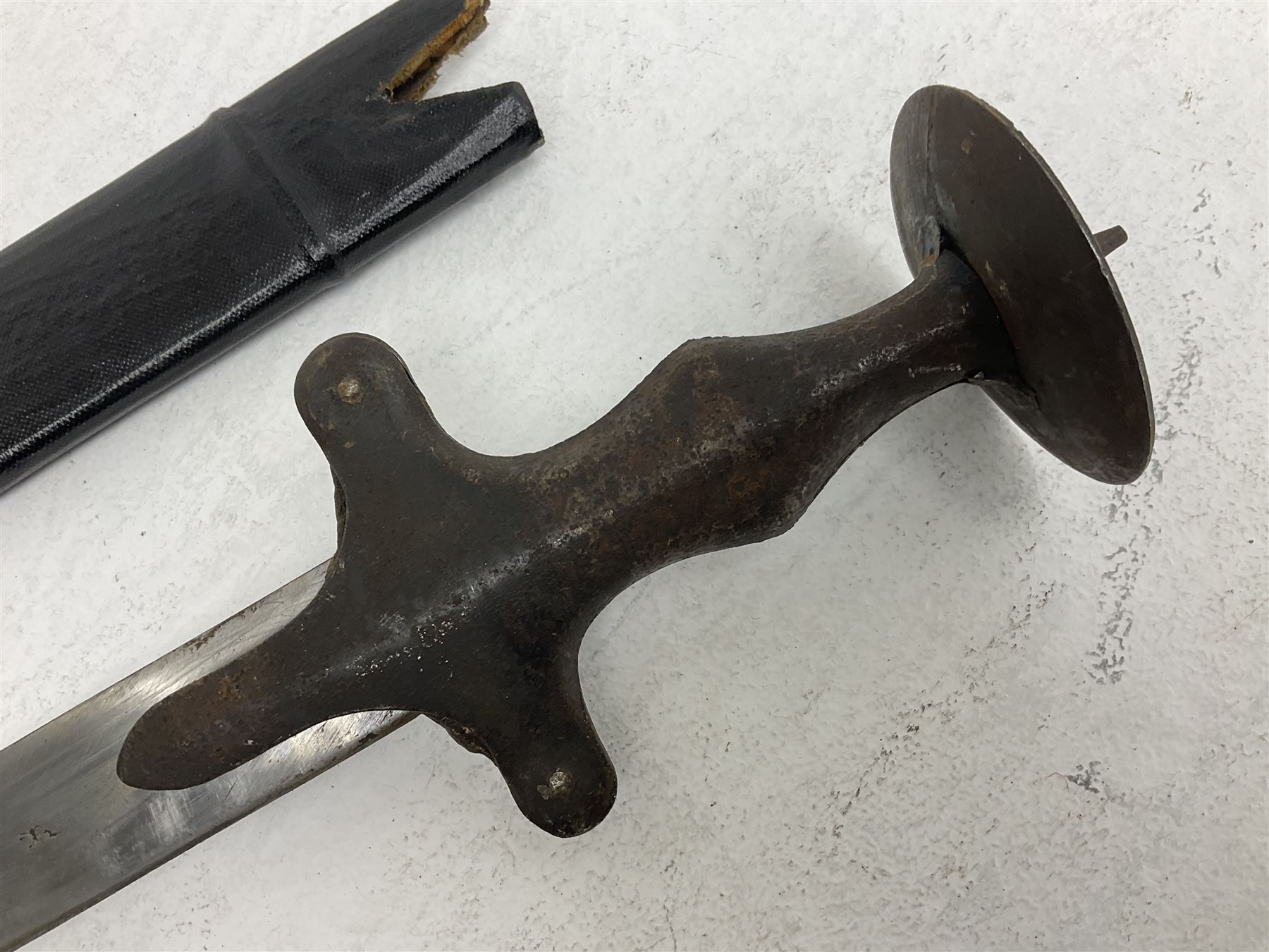 20th century Indian Tulwar sword with 71cm plain curving steel blade and iron hilt with extended langets, knopped grip and spiked pommel; in canvas covered wooden scabbard L87.5cm overall; together with five fencing swords comprising four foils and one epee, three marked Leon Paul, one in carrying case (6)