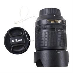 Nikon D7100 DSLR camera body, serial no. 2522259, with an AF-S Nikkor 18-105mm 1:23.5-5.6G ED lens, boxed with strap