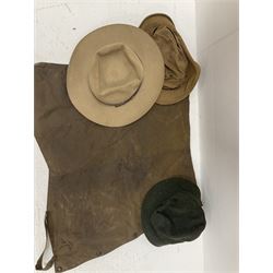 A ladies Barbour quilted dark green jacket, size 14, together with a further Barbour green quilted jacket, no size label, two Barbour 'pile lining' gilets/jacket inserts, two Barbour hats, three Akubra 'pure fur felt' hats, etc. 