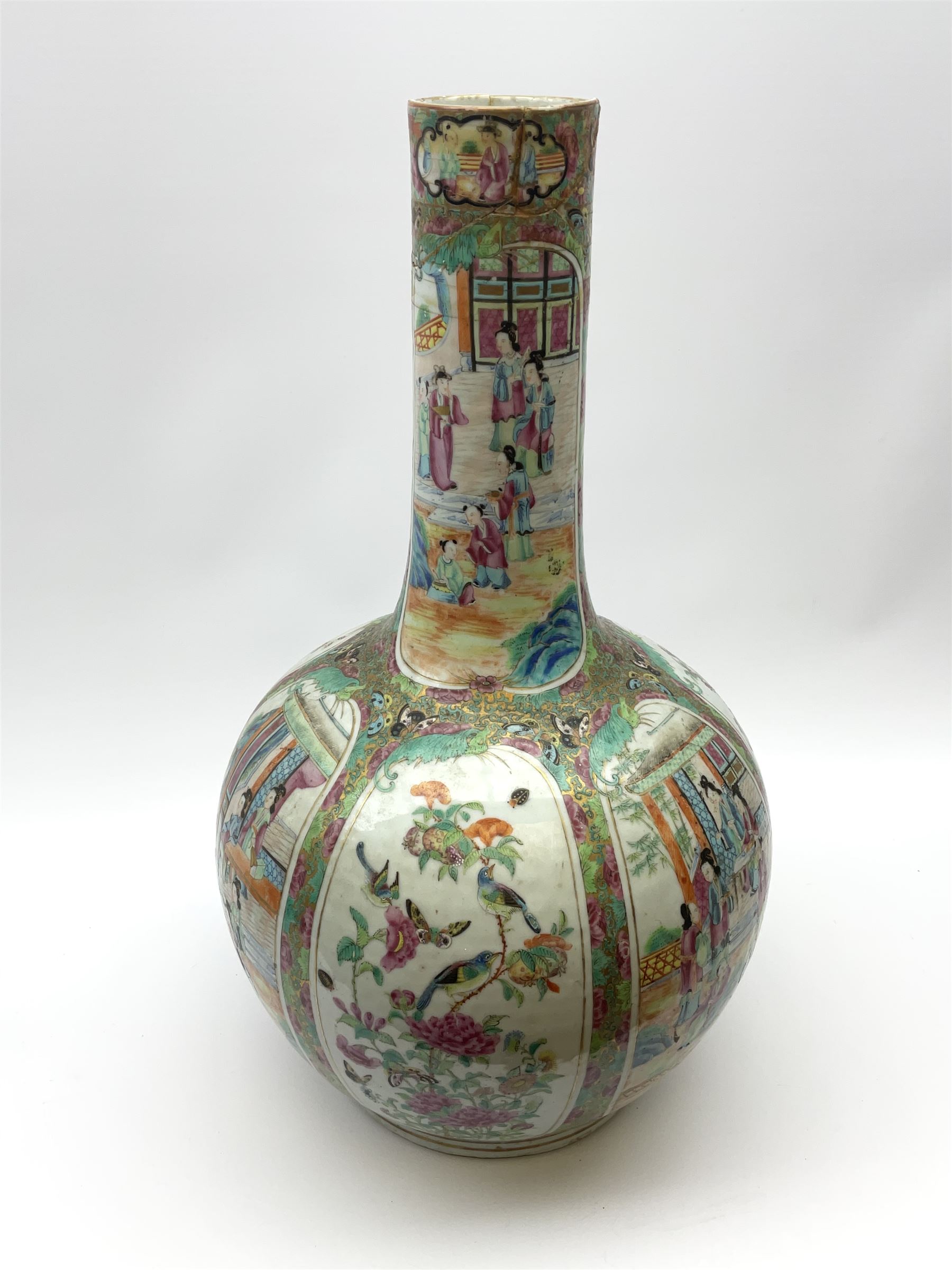 A 19th century Chinese Canton Famille Rose vase, of globular form with tall neck, and cover with finial, decorated with alternating panels of figural scenes, and birds and butterflies amongst blossoming and fruiting trees, with foliate surround against gilt, overall H57cm. 
