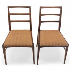 Richard Hornby for Fyne Ladye - mid-20th century afromosia teak dining table, tapered rectangular top with fluted edge and recess for spare leaf, raised on slender legs, four teak framed chairs, of ladder back design, with drop-in seat, upholstered seat, with tapered front legs and slightly raked rear legs,, table unextended width 106cm depth 79cm height 74cm with additional leaf 45cm wide- chairs width 48cm depth 41cm height 87cm 