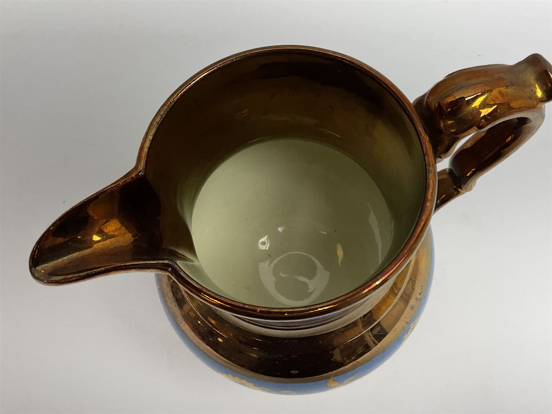 Victorian Wedgwood blue jasperware jardiniere H16.5cm; Victorian copper lustre jug; James Kent art deco style green glazed jug; and Beswick figure of a singing cat (4)