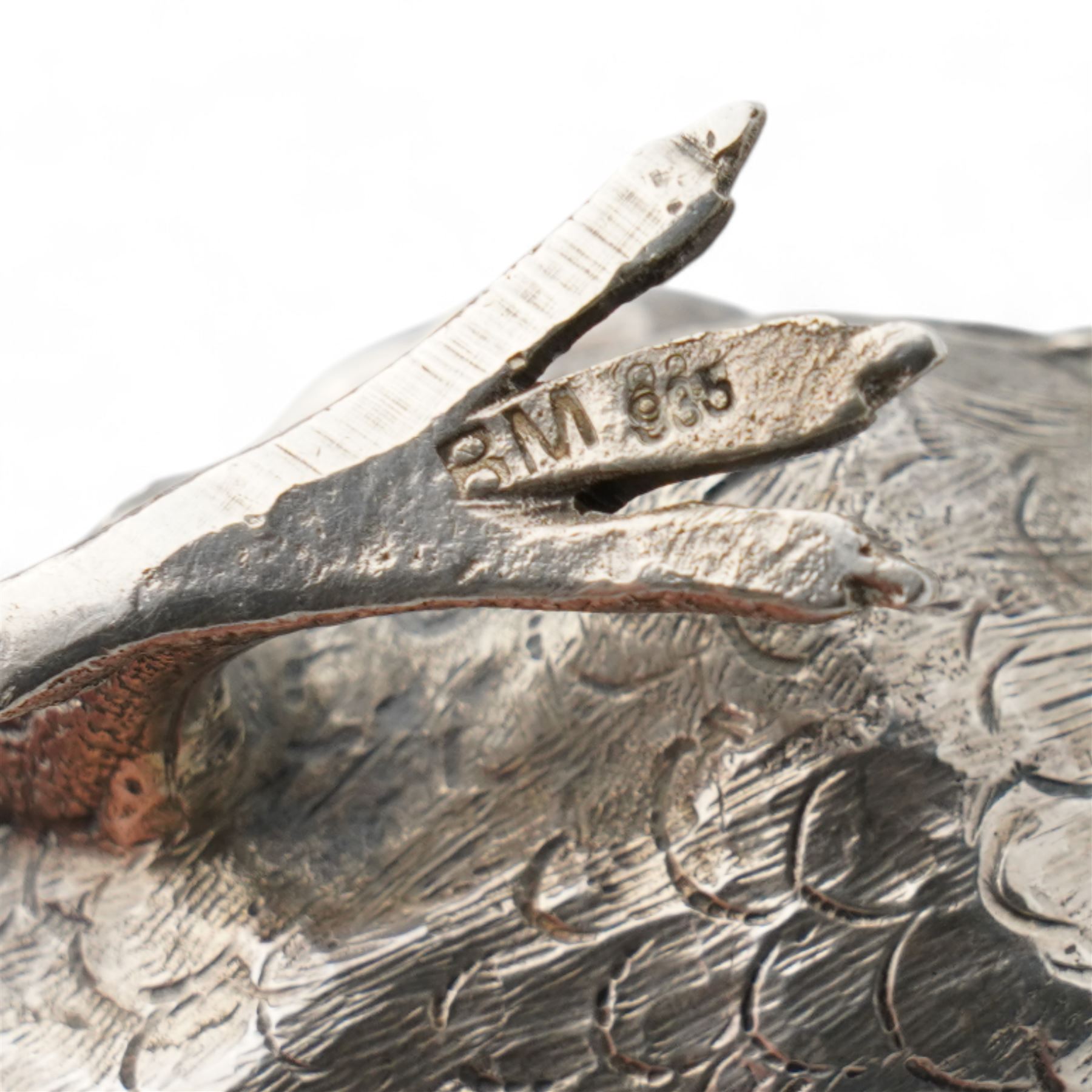   German silver novelty pepper pot in the form of a running chick, realistically modelled L8cm London 1922 Maker Berthold Hermann Muller and a silver jockeys cap caddy spoon Sheffield 1954 Maker Atkin Bros (2)